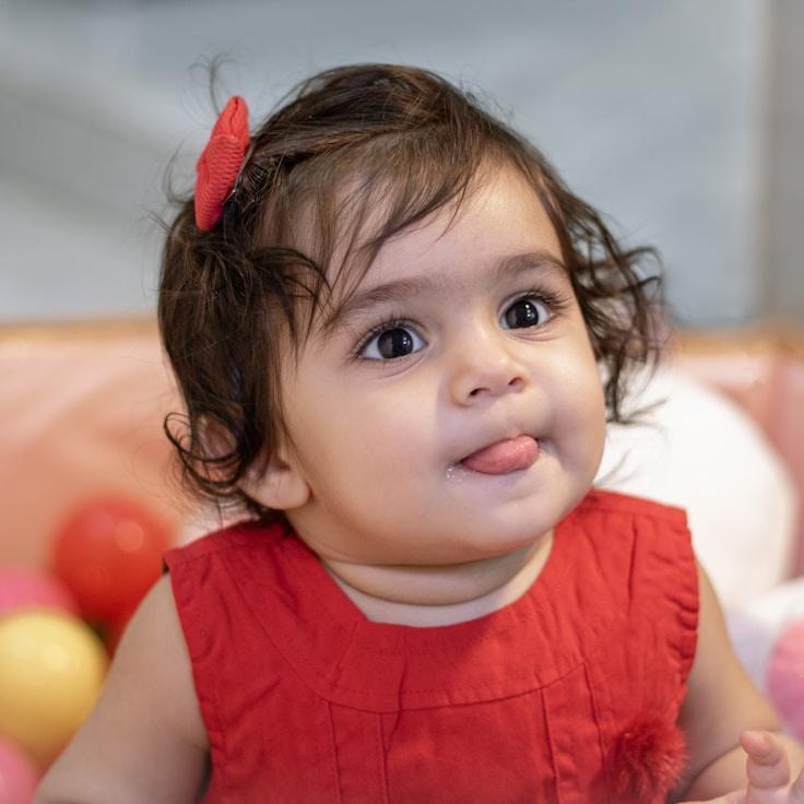 Avery Chen, Lead Design Curator at Lumen Pocket Grove, reviewing corporate floral arrangements